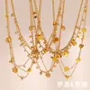 Colección de Cadenas Versátiles Elegantes de Acero Inoxidable Chapado en Oro de 18 Quilates Transfronterizas Europeas y Americanas Corazón Gota de Agua Flor de Circonita Clip Cadena de Bolas