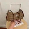 Bolsa de ombro/transversal minimalista com rebites 2026 para mulheres, nova tendência de outono, design chique de nicho