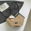 Bolsos de Diseño Nicho para Mujer 2025 Nuevo Bolso de Hombro de Moda Otoñal Versátil Bolso de Tela de Gran Capacidad Bolso Tote para Viajeros