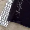 Al por mayor transfronterizo europeo y americano Camiseta de manga larga de otoño Rayas blancas y negras Bloques de color Diseño raglán Estampado Patrón Top de cuello redondo