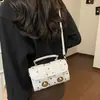 Alto Valor Estético 2026 Verano Nueva Moda Diseño Sencillo de Nicho Versátil Elegante Bolso de Hombro Cruzado Bolso Cuadrado Pequeño