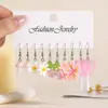 Moda nueva fresca y dulce resina simulación comida donas botanas paleta pendientes luminosos traje de varias piezas