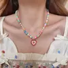 2024 Explosivo Diseño Amor Aceite Goteando Cadena de Clavícula con Perlas Temperamento Simple Color Caramelo Dulce Fresco Moda Collar para Mujeres