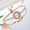 Nuevo reloj de pulsera extraíble de lujo, ligero y pequeño, con correa fina de perlas y flores incrustadas en diamantes.