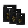 Bolso de Mano Plano de Cuatro Dedos Bolsa de Compras de Plástico para Tienda de Ropa Bolso de Regalo de Joyería de Alta Gama Transfronterizo en Stock
