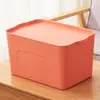 Caixa organizadora de itens diversos espessa caixa de armazenamento de plástico à prova de poeira para livros de brinquedo caixa de armazenamento para material de escritório cosméticos com tampa