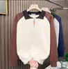 Suéter de punto con cremallera a media altura, bloques de color y cuello de solapa, estilo japonés, versión coreana para hombre, jersey casual con cuello polo, top de punto, chaqueta