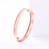 Pulsera de tarjeta de suministro de fábrica Pulsera de destornillador LOVE Pulsera de pareja Acero de titanio Chapado en oro rosa Pulsera de cruz Venta caliente transfronteriza