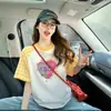 Camiseta de Manga Corta Raglán a Cuadros y Bloques de Color para Mujer, Nuevo Verano 2026 Estilo Universitario Retro Reductora de Edad Top Holgado