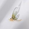 Nova Broche Libélula com Asas Transparentes Banhada a Cobre Ouro Real Xizi Acessórios de Roupa com Senso Avançado Broche Borboleta