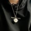 Collar giratorio de cara sonriente acero de titanio expresión giratoria hip hop estado de ánimo inverso artístico hombres y mujeres colgante de cara llorando joyería moderno nuevo