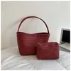 Bolso de axila tejido de lujo ligero de alta gama, bolso simple de moda para madre e hija, bolso de hombro casual de estilo coreano para el día a día