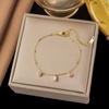Pulseira de aço inoxidável de alta qualidade, nicho, não desbota, best-seller transfronteiriça, para menina, corda vermelha Pérola, pulseira de Trevo, joia