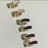 Pendientes de esmalte blanco con hebilla, ligeros, de lujo, de alta gama, elegantes, de moda, diseño de nicho, combinables para mujer, 2024