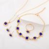 Conjunto de cuatro piezas de collar, pendientes, anillo y pulsera con corazón de melocotón, joyería de amor de cristal europea y americana transfronteriza de Amazon.