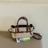 Bolsa Tote Nova Outono 2026 Feminina Grande Capacidade Bolsa para o Dia a Dia Estilo Vintage Bolsa de Ombro Único Sob o Braço Bolsa Grande de Mão