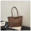 Tendencia de Comercio Exterior Europeo Americano Transfronterizo Gran Capacidad 2026 Nuevo Estilo Diseño de Moda Bolso Tote Tejido para Viajes Diarios Bolso de Hombro Único
