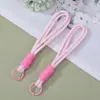 Lanyard para teléfono macaron de doble capa con bloques de color, cuerda tejida de color dopamina, accesorio para llaves y teléfono, correa de muñeca anticaída