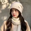 Borde enrollado cálido a prueba de viento protección para los oídos sombrero holgado estilo nuevo color liso pequeña decoración de logo temperamento versátil casual sombrero de punto
