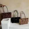 Bolso de hombro tipo tote Melard estilo vintage esmerilado para mujer, principios de otoño, gran capacidad, ligero, lujoso, de nicho y de alta gama.