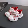 2026 Nuevo Modelo Zapatos Deportivos de Suela Ligera de Eva para Niños y Niñas al por Mayor Estilo Coreano Zapatos de Malla para Niños Zapatos Rojos de Año Nuevo 5587