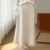 Nueva falda larga de punto de lana pura para otoño e invierno para mujer, falda jacquard hueca de moda con forro, falda de paraguas de dobladillo ancho
