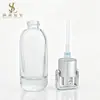 Frasco de vidro tipo pump de 30ml para líquido essência do fabricante, material de embalagem para frasco dispensador de loção aquosa com tampa tipo cesta de fundo grosso de 40ml