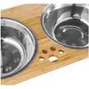 Comedero para mascotas de tamaño ajustable con 2 cuencos de metal y una almohadilla de silicona en la parte inferior, diseño simple y elegante