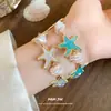 Pulsera de Estrella de Tablero de Perlas Transfronteriza Europea y Americana Estilo de Moda para Vacaciones Pulsera de Lujo Ligero Sensación de Alta Gama Joyería de Mano Venta al por Mayor