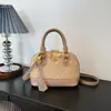 Bolso de mujer de alta gama 2026 nuevo modelo versátil bolso tipo concha estampado, elegante y con estilo, colores contrastantes, bolso de hombro y cruzado vintage