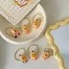 Lindo elástico para el pulgar de dibujos animados, cuerda elástica para coleta de capibara estilo ins, accesorio para el cabello elástico sin costuras suave y lindo de color amarillo cremoso