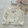 Ropa Infantil de Primavera 2026 Nuevo Estilo Cardigan con Tirantes Estilo Coreano para Niñas Conjunto de Dos Piezas Atuendo de Primavera de Bebé de Moda