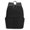 Mochila de viaje, para ir al trabajo y para la escuela de diseño minimalista, tela de nailon, impermeable, versátil, moderna, mochila para mujer de estilo simple