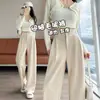 Pantalones de traje de pierna ancha con mezcla de lana estilo coreano para mujer 2026 Principios de otoño Versión estrecha extendida Espiga Caída Pierna ancha Pantalones blancos