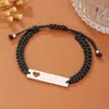 Pulsera tejida para el Día de San Valentín, etiqueta de acero inoxidable, corazón de amor hueco grabado, pulsera de nicho para parejas, venta al por mayor