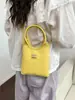 Bolso de Mano Versátil de Color Sólido para Mujer, Estilo Nuevo con un Toque de Lujo, Moderno, Sencillo, Casual, Bolso de Hombro para el Trabajo, Transfronterizo