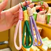 Nuevo Estilo Coreano Dopamina Taza de Agua Simple Bolso con Cordón Tejido Llavero Adorno de Cordón de Cuentas Perler DIY Accesorios