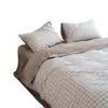 Juego de cuatro piezas de algodón puro a rayas estilo japonés, juego de sábanas y fundas de edredón 100% algodón modelo nuevo 2026, juego de tres piezas para ropa de cama de dormitorio estudiantil