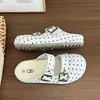 Sandalias tipo mule sin cordones de lunares de moda 2026 otoño nueva moda planas estilo Birkenstock para mujer para usar con faldas