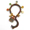 Pulseira do deus da riqueza de cinco vias estilo Xizang oito santos padroeiros cinco mestres Manjushri deus da riqueza amarelo thangka corda tecida à mão pulseira do ano desta vida