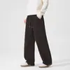 Pantalones negros para hombre 2026 nuevos de otoño de pierna ancha de alta gama holgados rectos casuales con cordón pantalones largos modernos