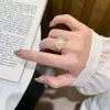 Anillo Redondo de Perla Shijia con Patrón de Caracola de Corazón Dorado Brillante para Mujer, Anillo de Nicho de Lujo Ligero de Alta Gama para Viajes Diarios