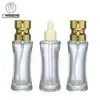 En stock venta al por mayor 35ml botella de loción protectora solar de cintura pequeña y base gruesa gotero botella secundaria de vidrio para aceite esencial esencia