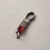 Llavero de cuerda trenzada de fábrica, accesorios de ferretería, hebilla de herradura, colgante para llave de coche, accesorios de moda para coche