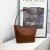 Bolso Cubo Tejido Simple Nuevo de Verano 2026, Moderno y Elegante, Bolso de Mano de Nicho para el Trabajo, Bolso de Hombro Casual para el Día a Día