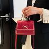 Bolsa Pequena Doce com Laço Tendência deste Ano para Mulheres 2026 Novo Design de Nicho Bolsa de Ombro Elegante e Fashion para o Dia a Dia