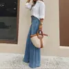 Jeans de Pierna Ancha Lavados Vintage Nuevos Primavera/Verano 2026 Europeos y Americanos Transfronterizos, Corte Holgado, Adelgazantes y que Aumentan la Altura, Jeans de Algodón para Mujer