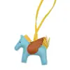Pendente de Pônei Mais Vendido Transfronteiriço Pingente de Bolsa de Couro PU Chaveiro de Carro Pingente de Bolsa de Pégaso Ano do Cavalo Pequeno Presente