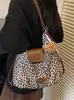 Nova bolsa tote popular Yuezhi 2026 outono inicial, bolsa de ombro retrô moderna com estampa de leopardo, bolsa de bolinho