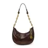 Bolso de Axila con Textura de Nicho Estilo Francés para Mujer 2025 Nuevo Bolso Simple de Media Luna Bolso de Hombro con Cadena de Moda para Viajar